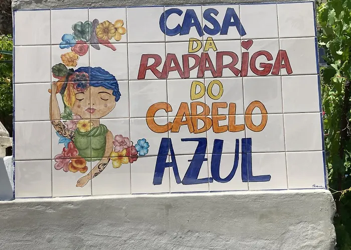 A Casa Da Rapariga De Cabelo Azul
